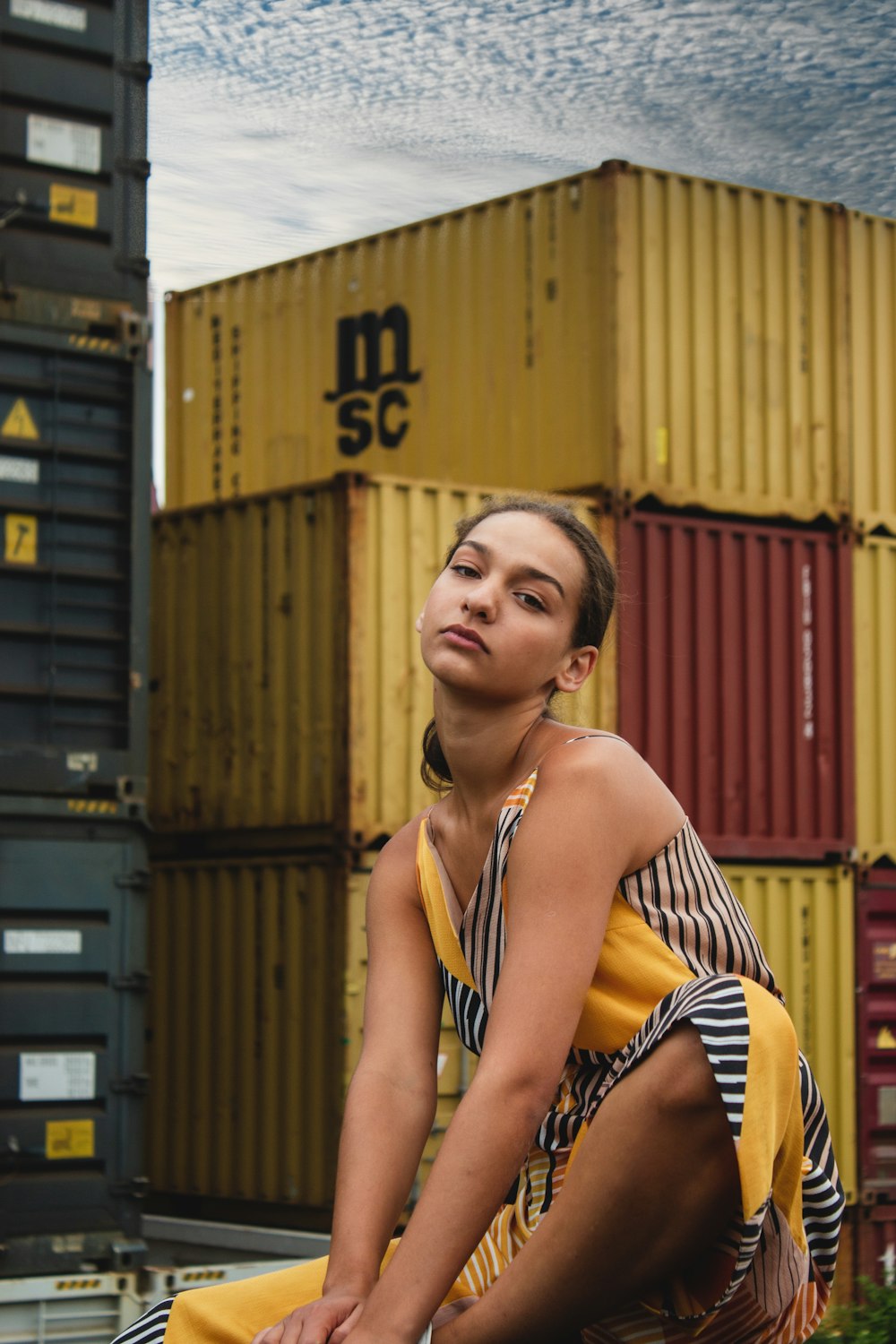 a woman sitting on a bench