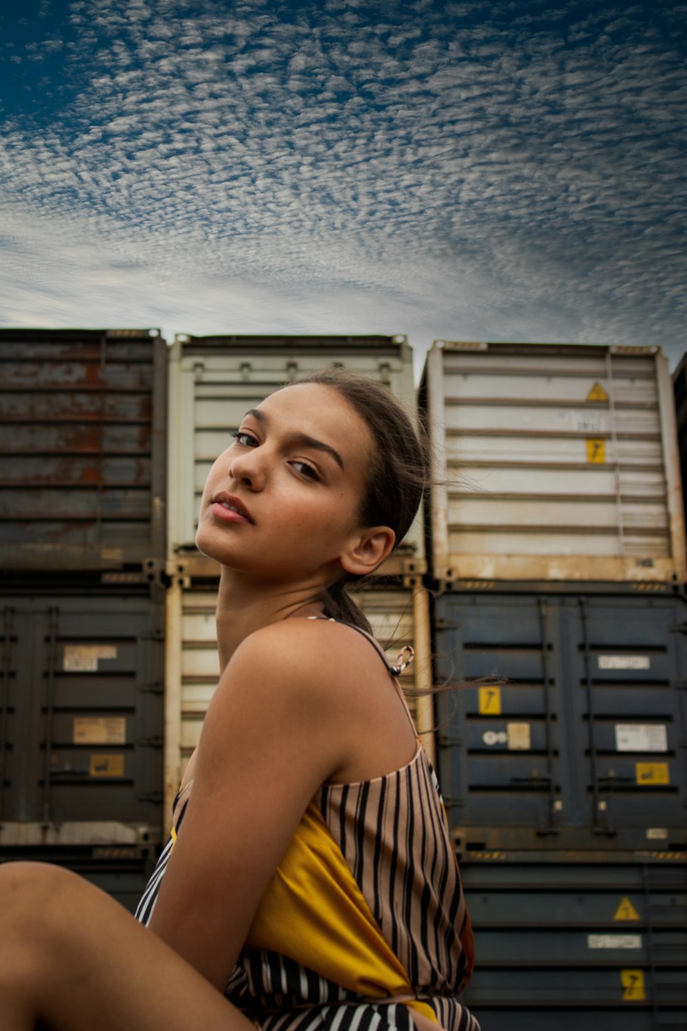 a woman in a striped shirt