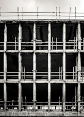 a black and white photo of a prison cell