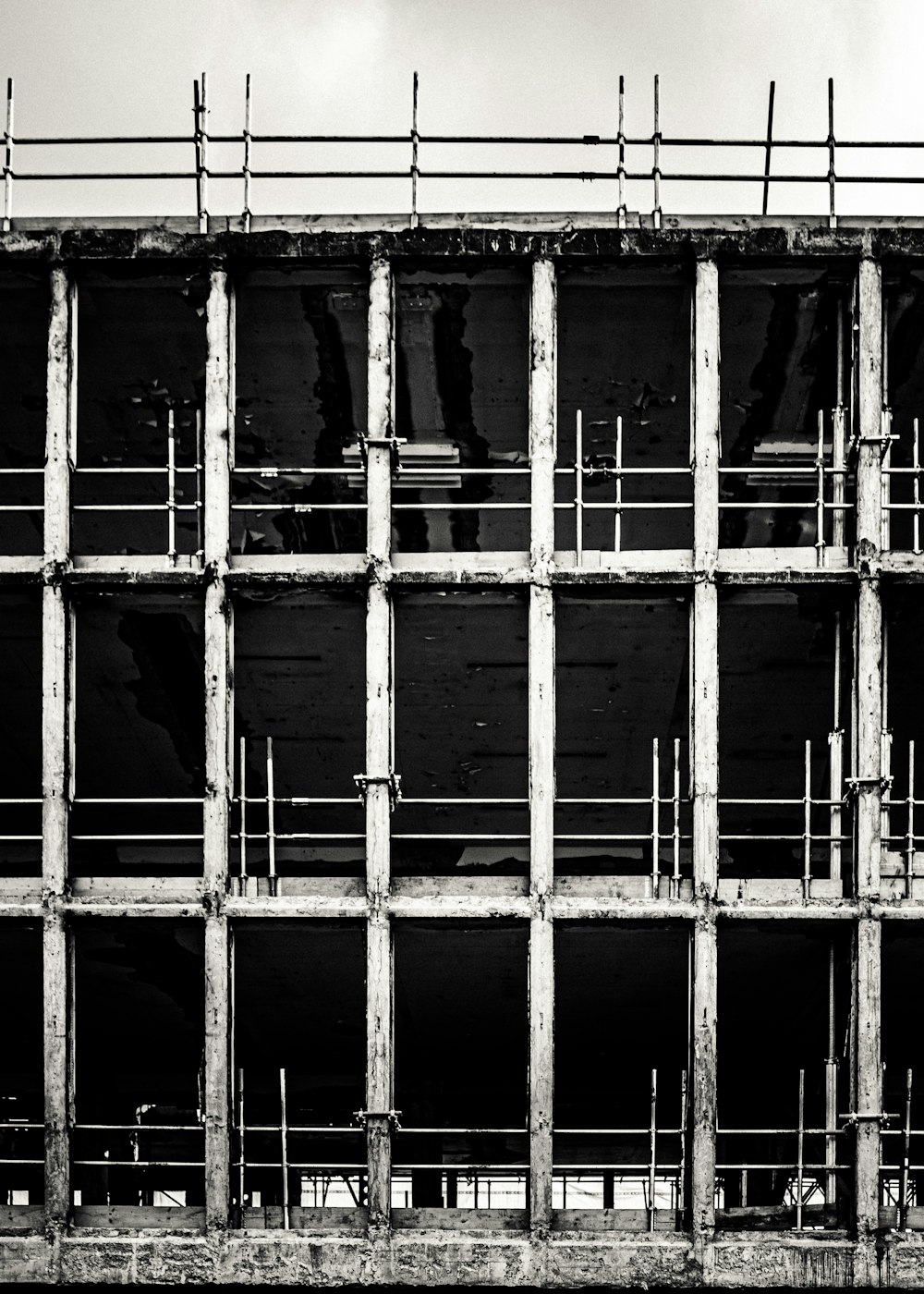 a black and white photo of a prison cell