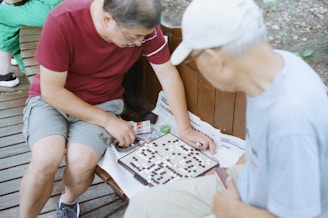 a group of people playing a board game