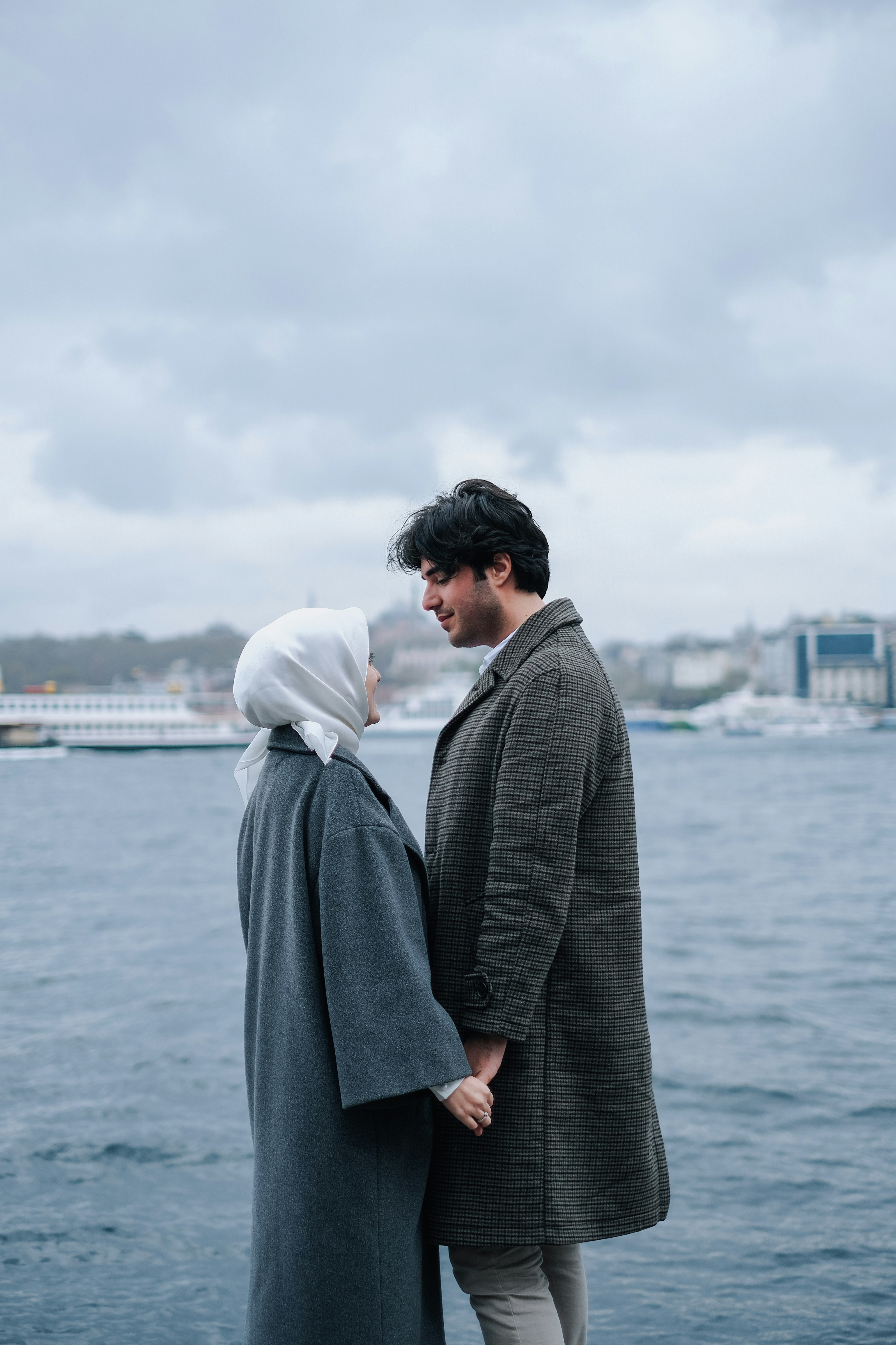 Muslim couple speaking together in a calm modern setting