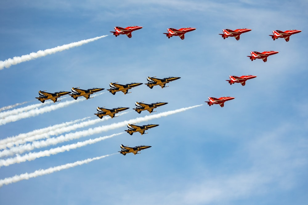 a group of planes flying in formation