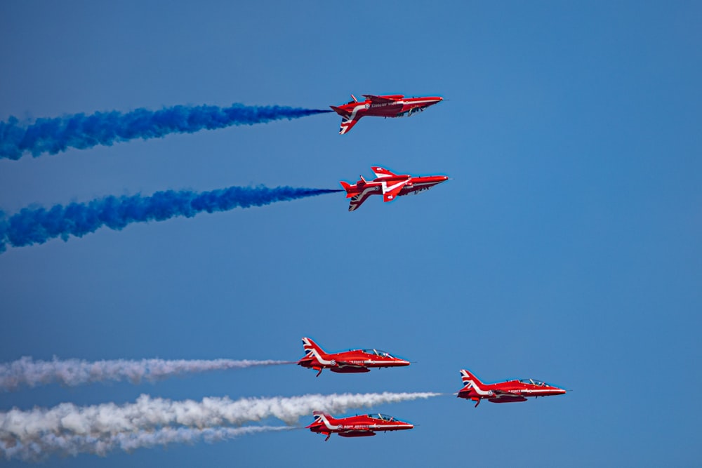 a group of airplanes flying in formation
