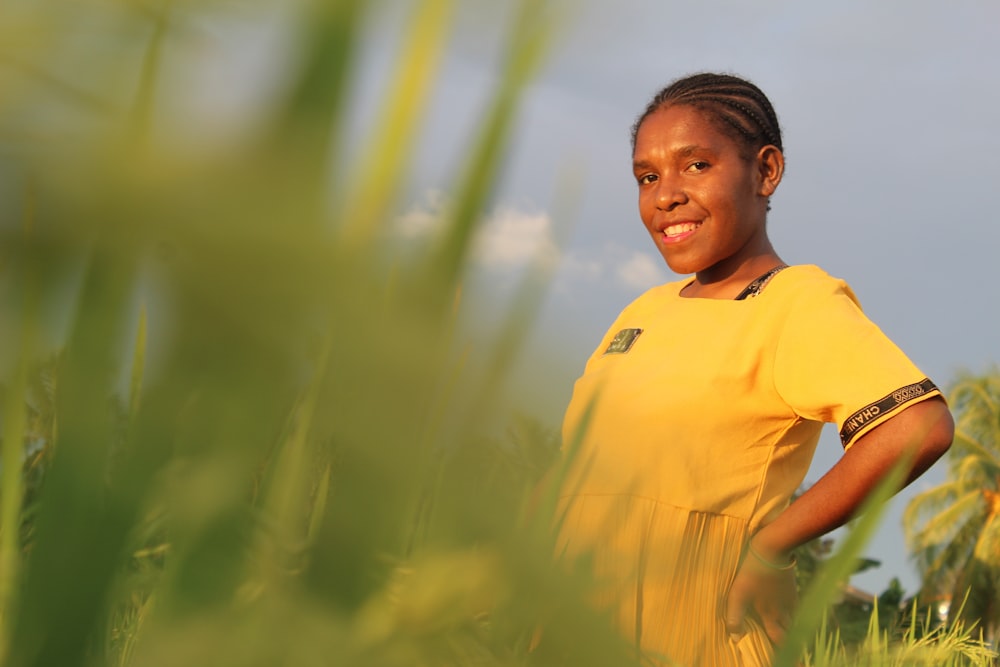 a person in a yellow shirt