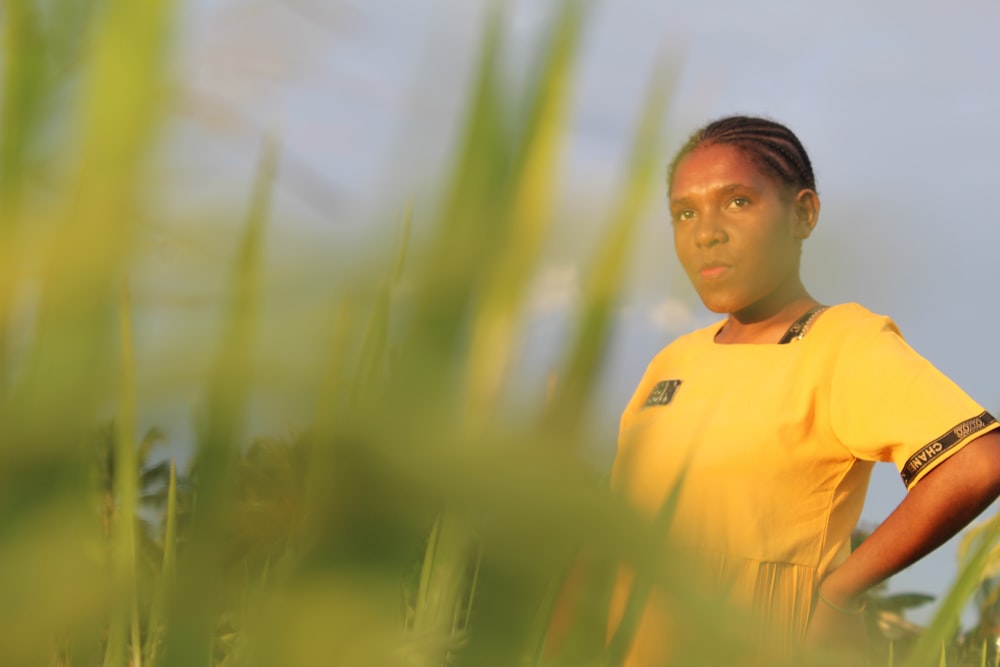 a person in a yellow shirt