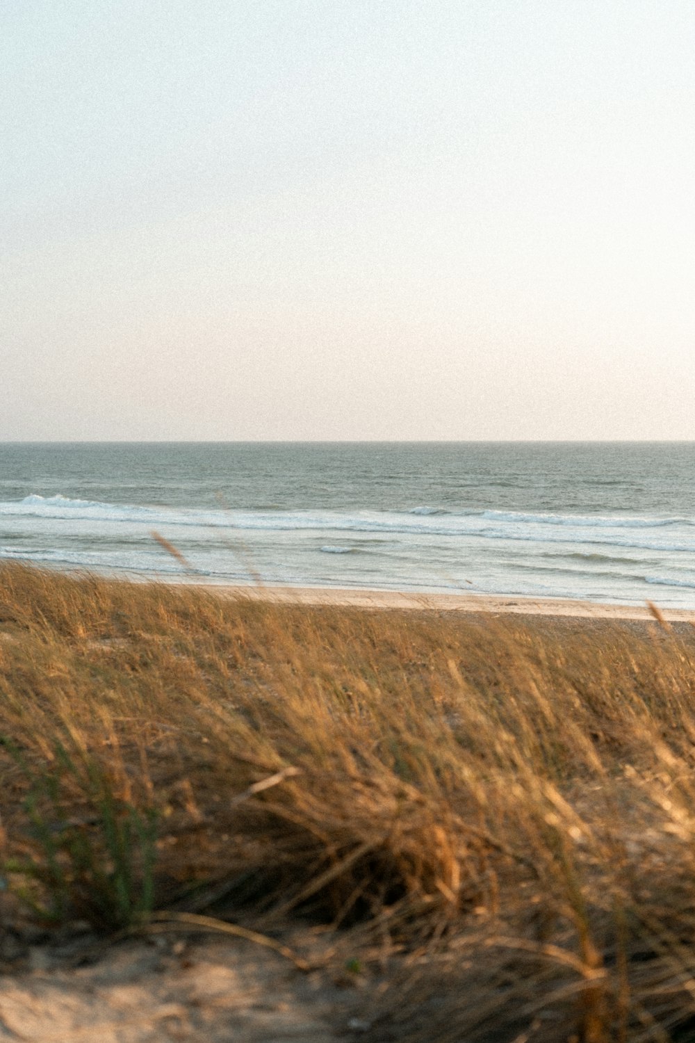 a beach with waves crashing