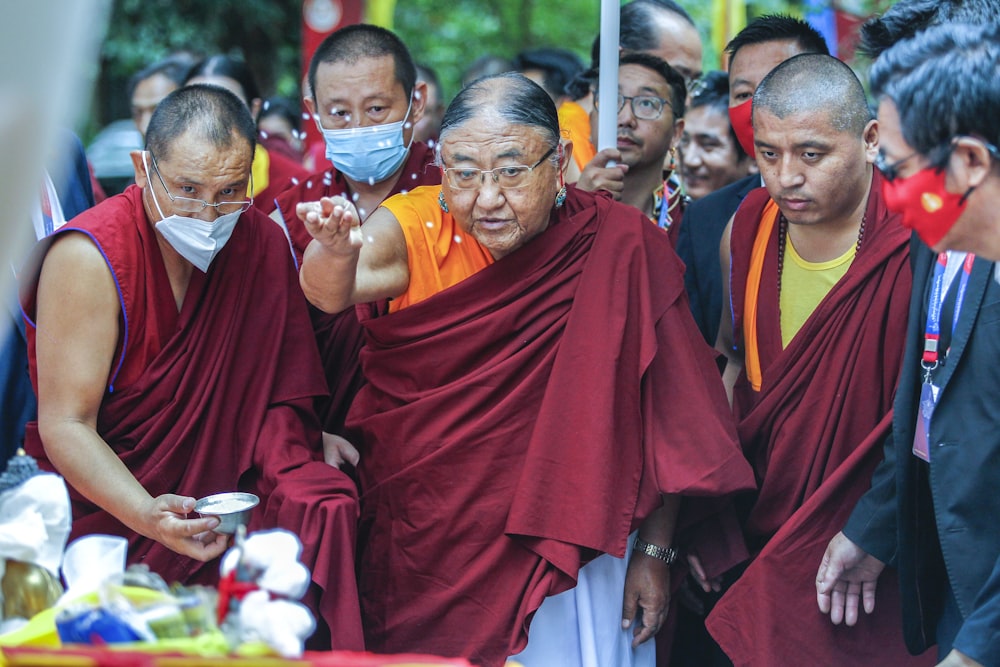 a group of people wearing face masks