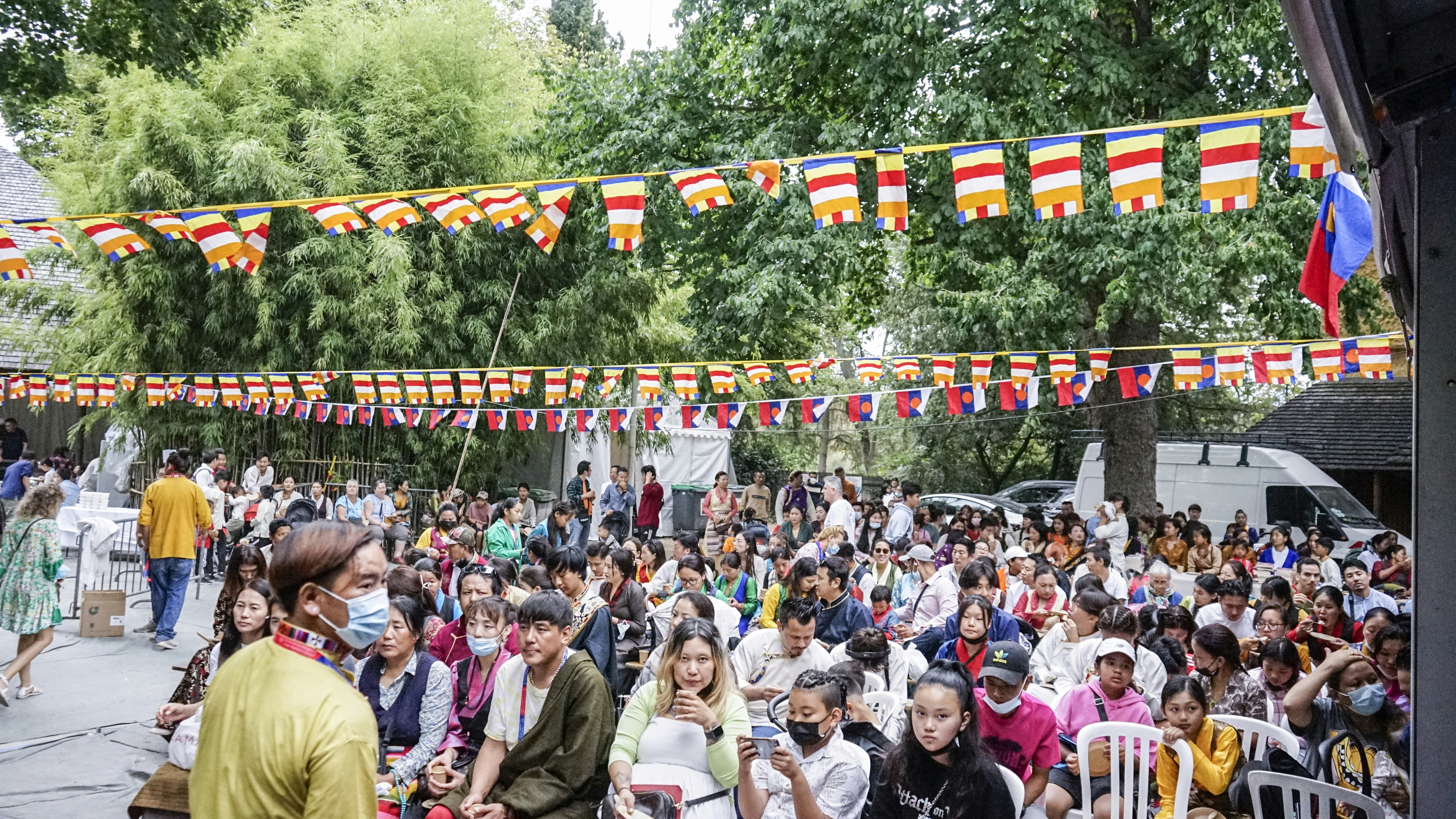 A crowd of people walking with flags photo – Free Pagoda Image on Unsplash