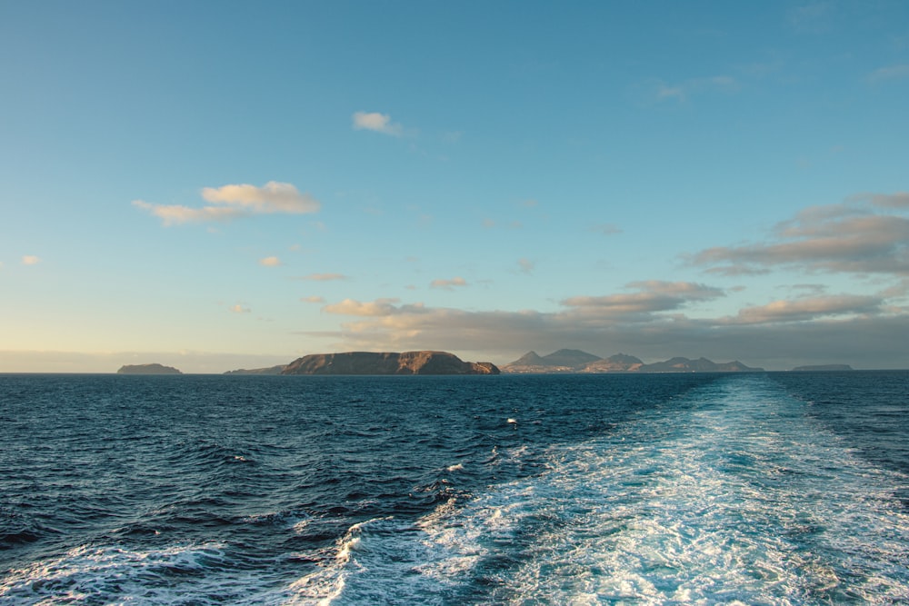 a body of water with a land in the distance