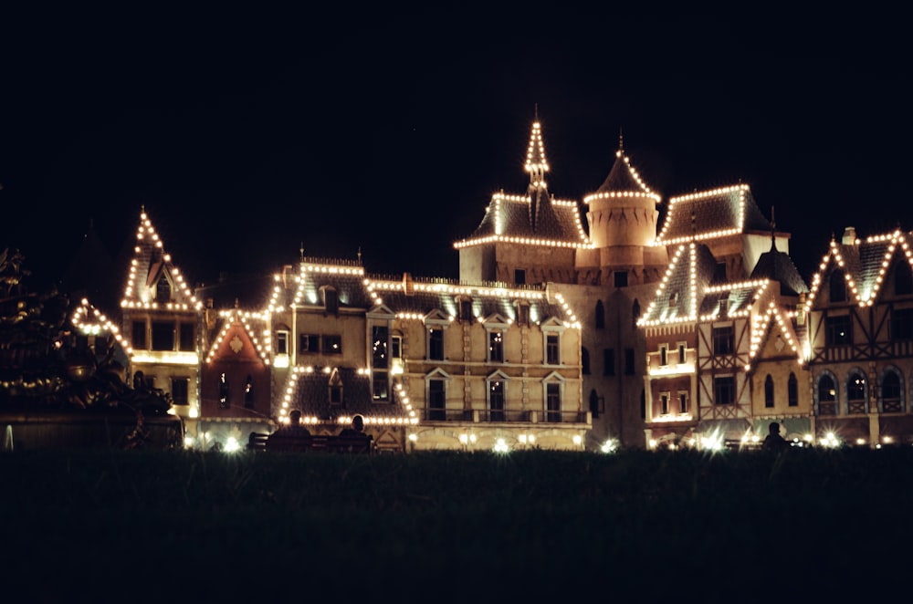 a large building with lights on at night