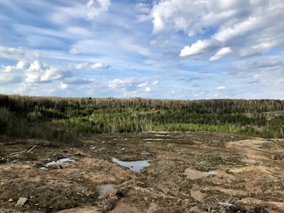 Brazilian landscape with natural resources like rivers and forests under clear sky.