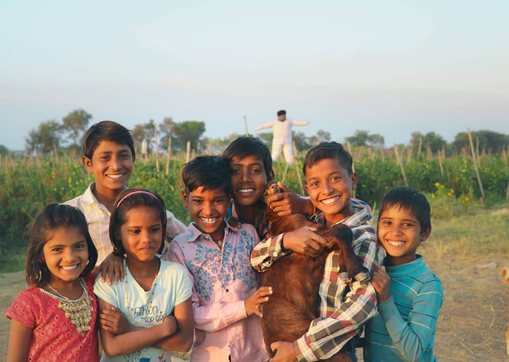 a group of people posing for a photo