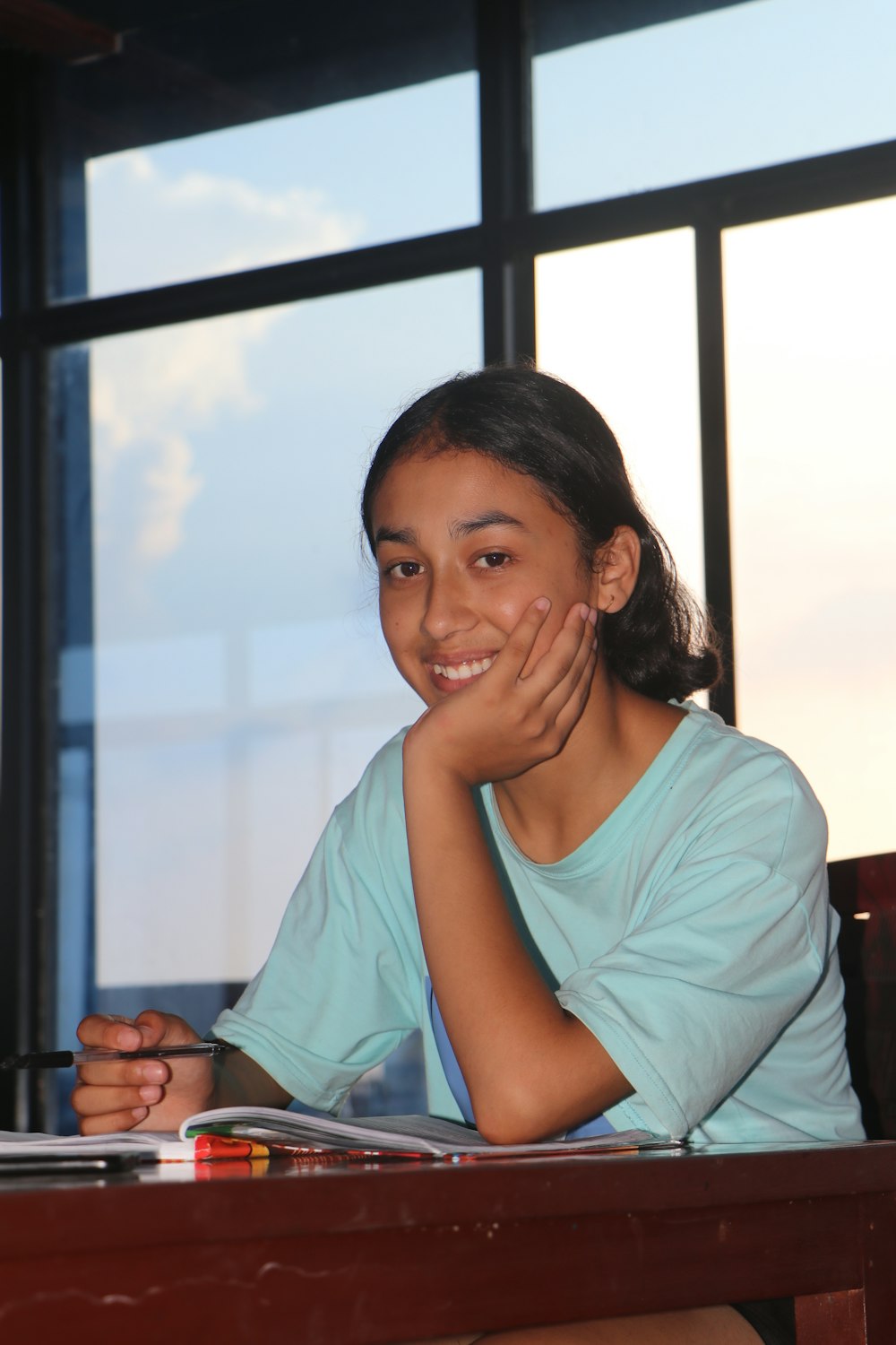 a woman sitting at a desk