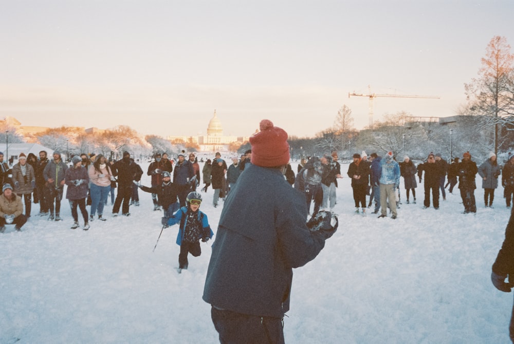 a crowd of people in the snow