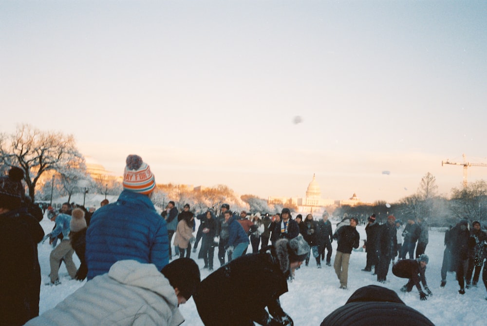 a group of people in the snow