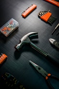 a group of tools lay on a table