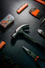 a group of tools lay on a table