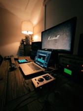 a laptop sits on a desk