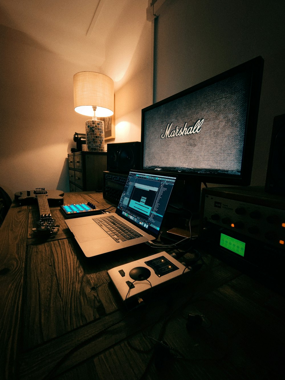 a laptop sits on a desk