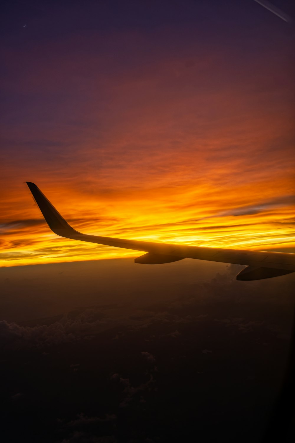 a plane flying over a city