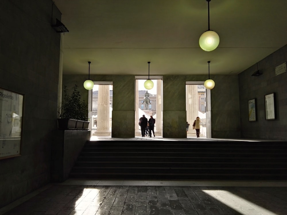 a group of people walking down a flight of stairs