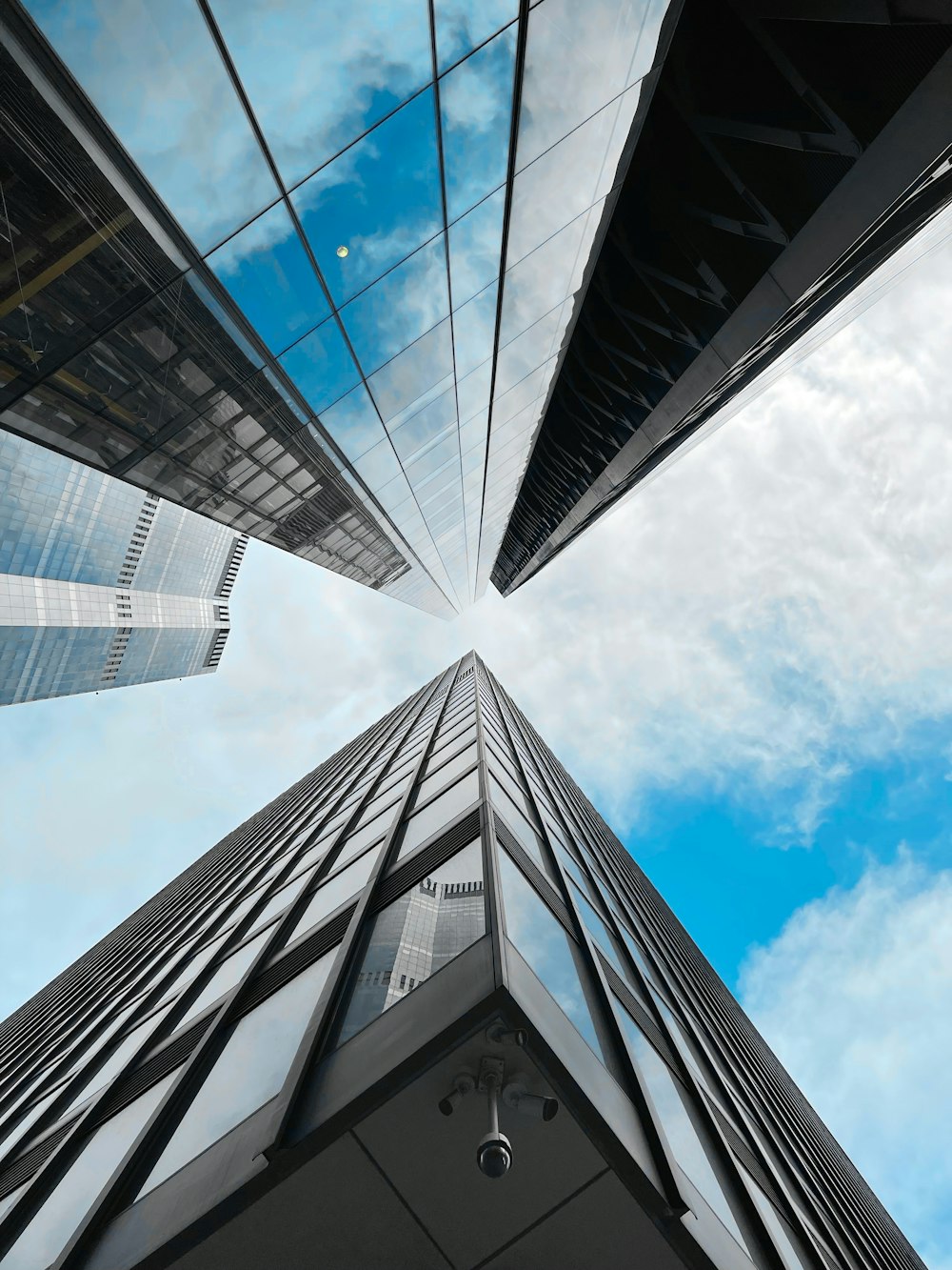 looking up at tall buildings