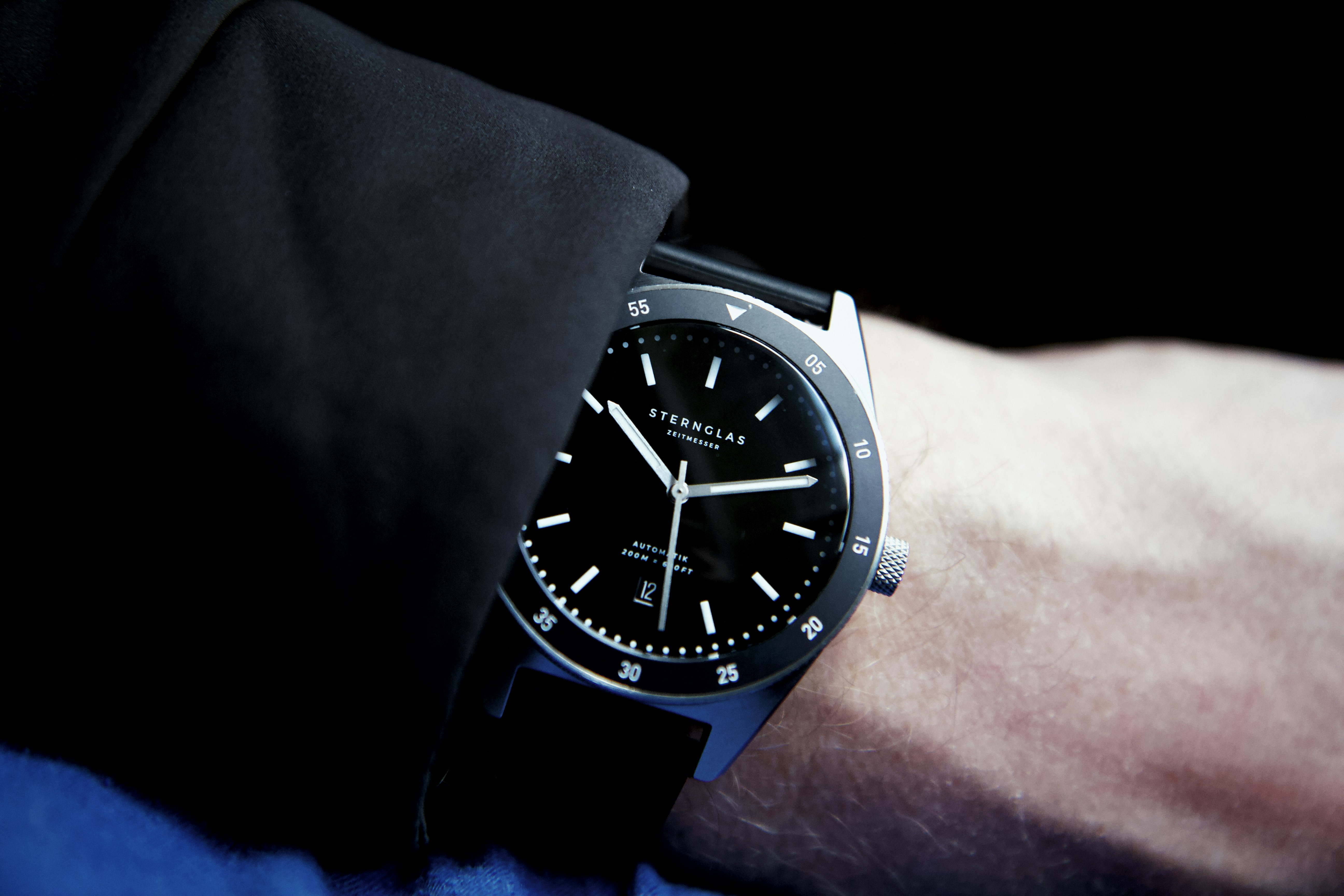 a black watch on a person