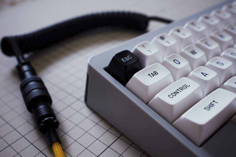 a cord plugged into a keyboard