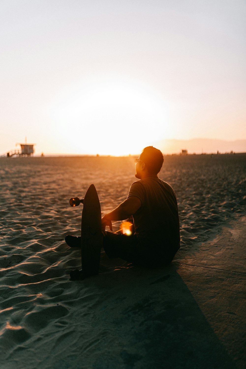 a person sitting on a beach