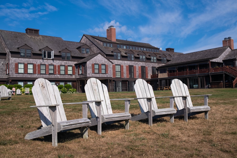 a row of chairs in a field