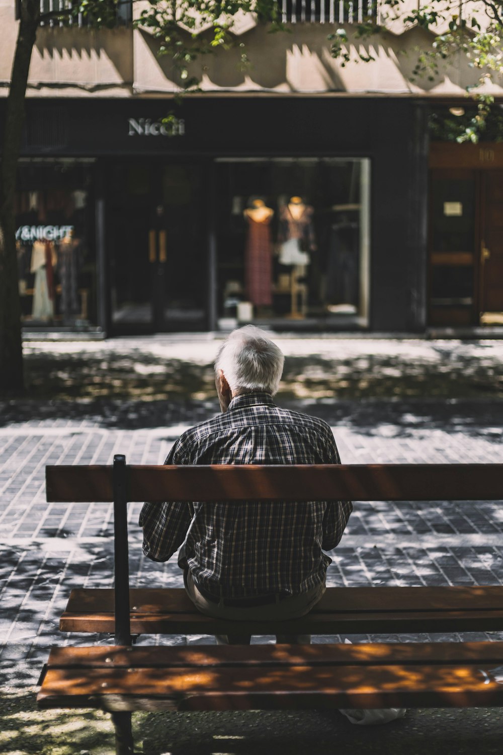 a person sitting on a bench