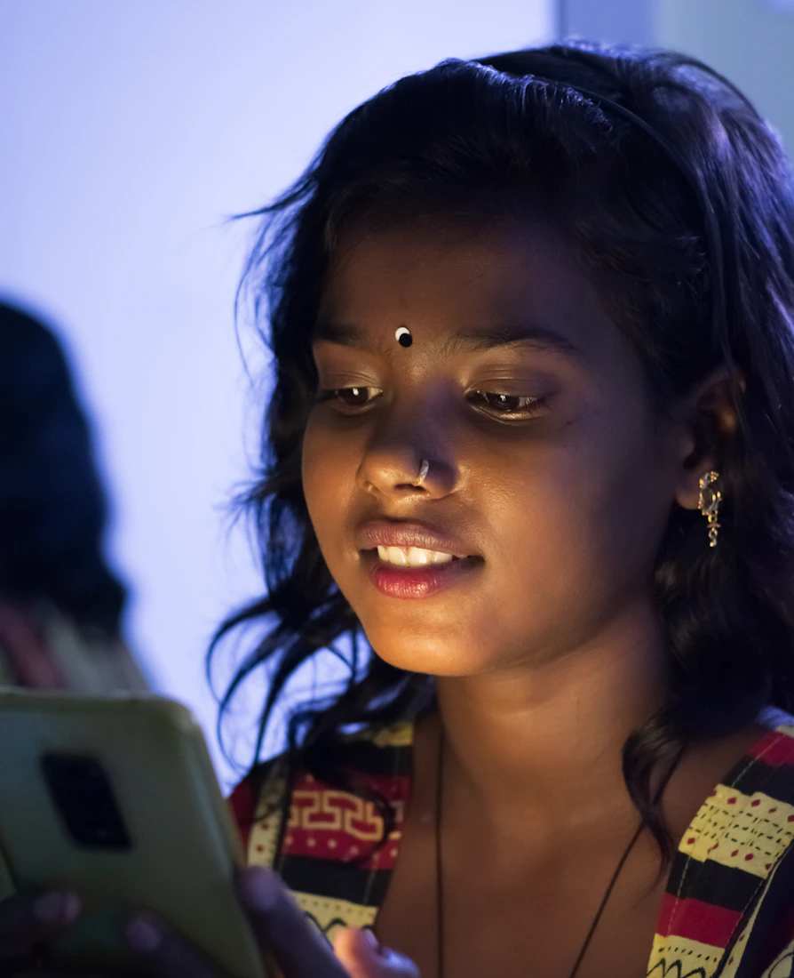 Patient chatting with AI UPCHAR on her phone