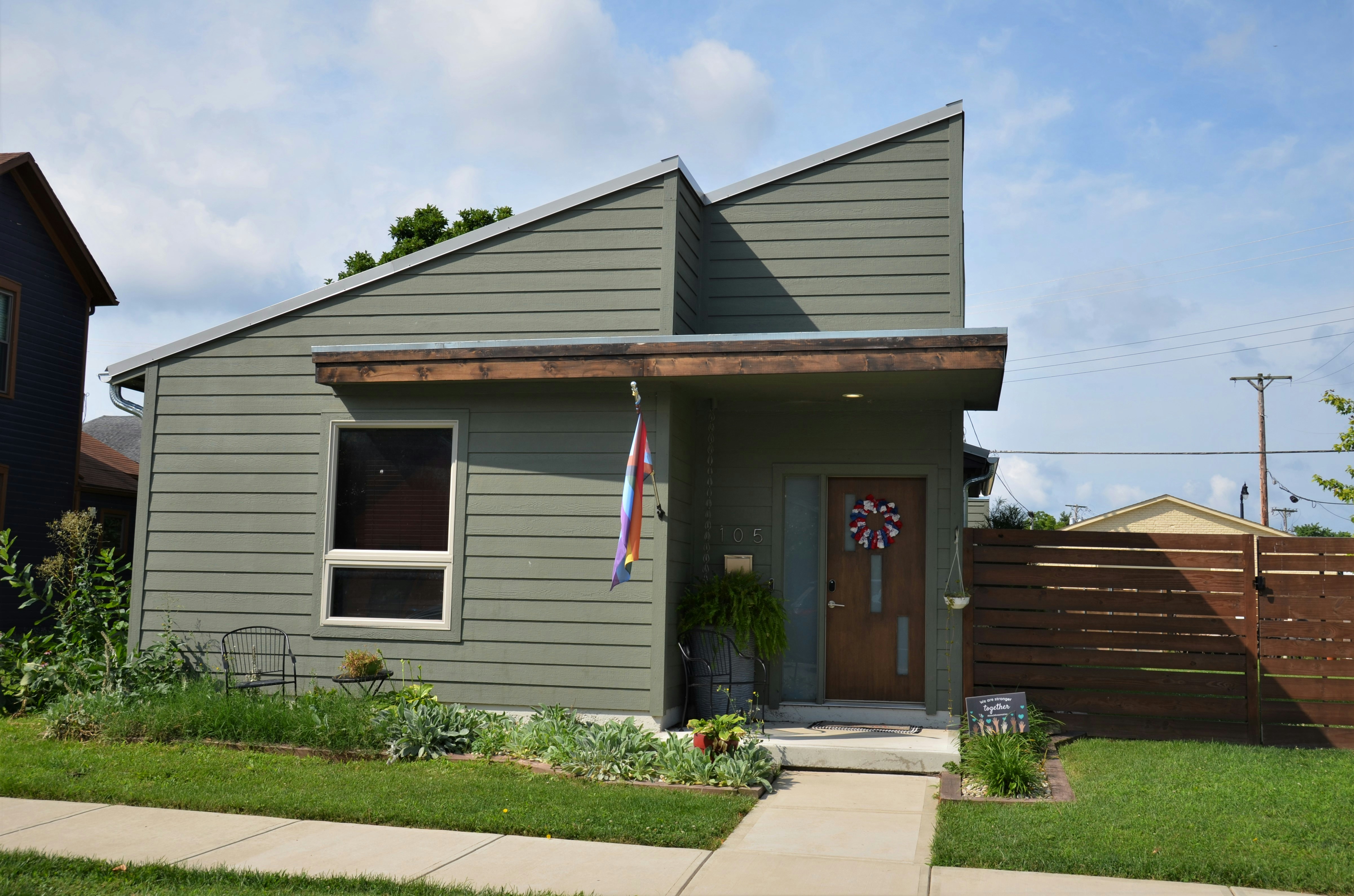 Detached ADU backyard cottage beside main house illustrating DSCR loan ADU accessory dwelling financing