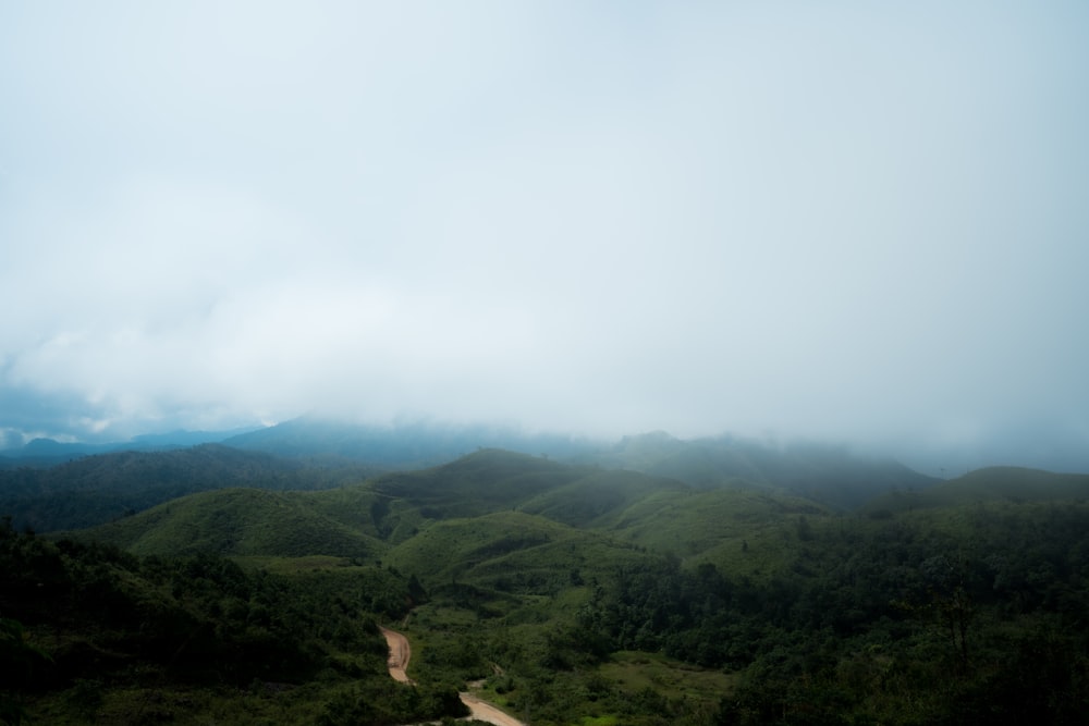 a landscape with hills and trees