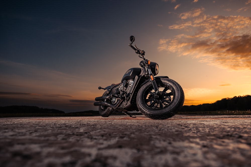 a motorcycle parked on a beach