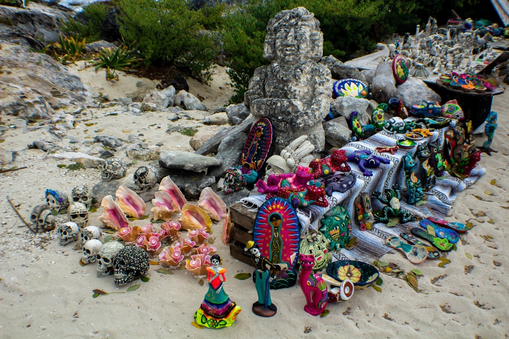a group of toys on a rocky surface