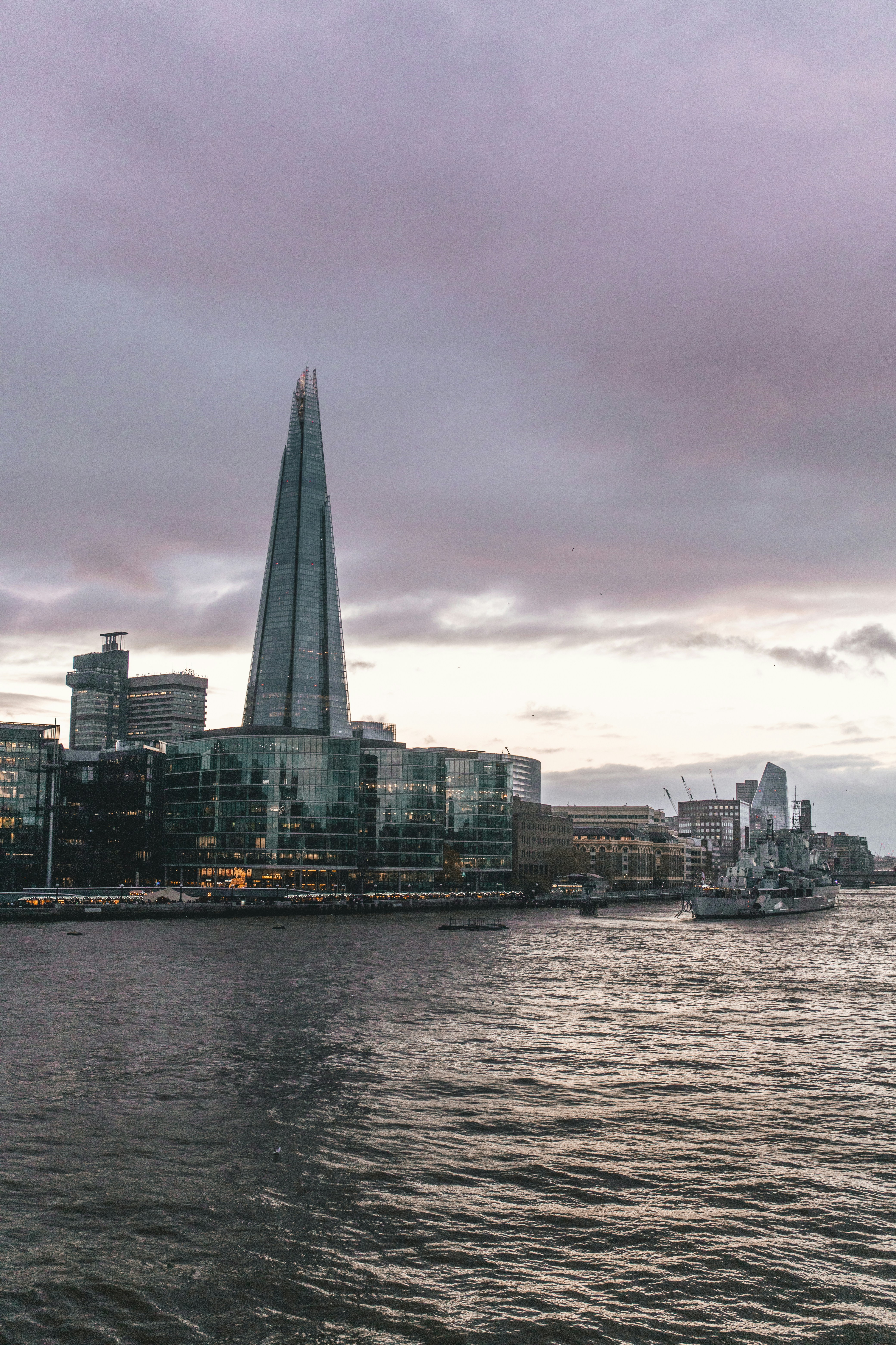 a large building next to a body of water