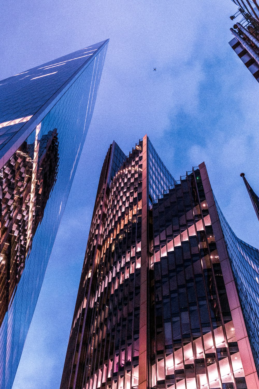 a tall building with a blue sky