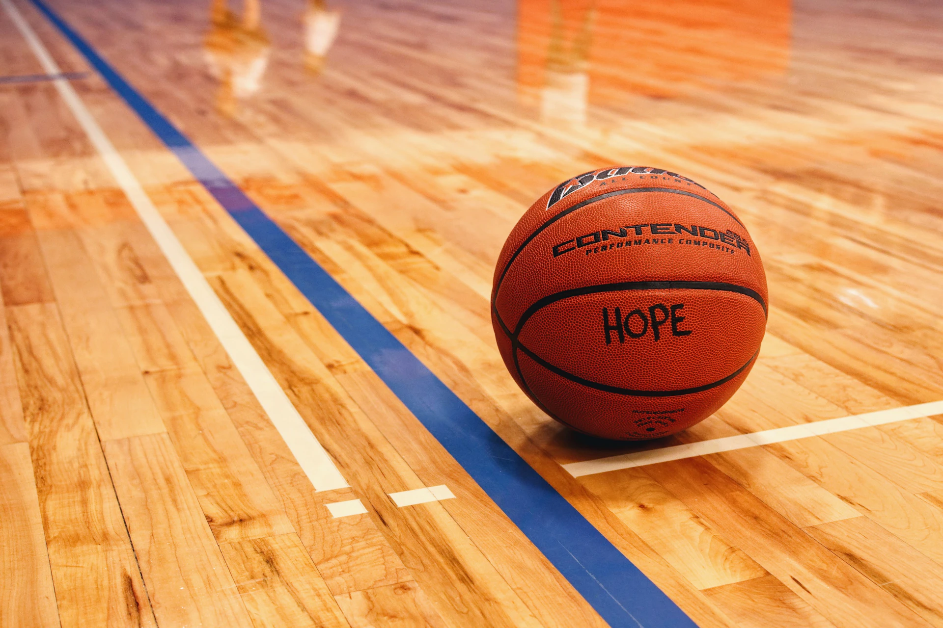 a basketball on a wooden floor