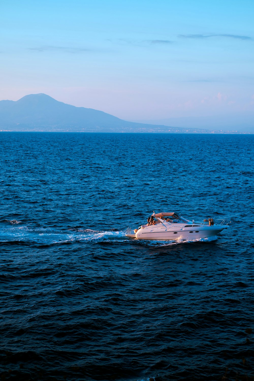 a boat sailing in the sea