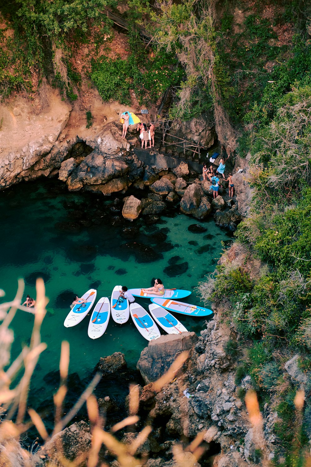 a group of people on kayaks in a river