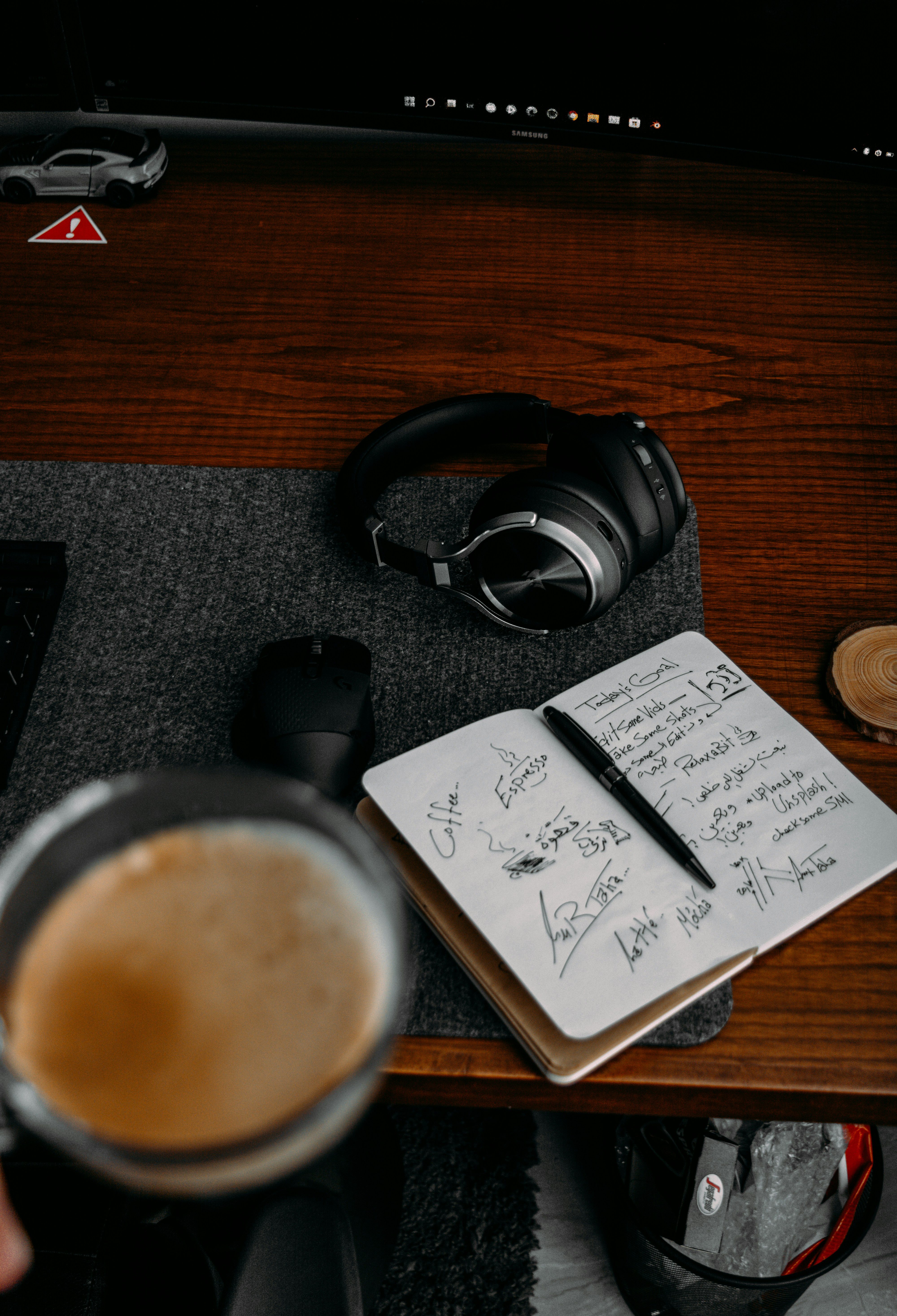 a cup of coffee and headphones