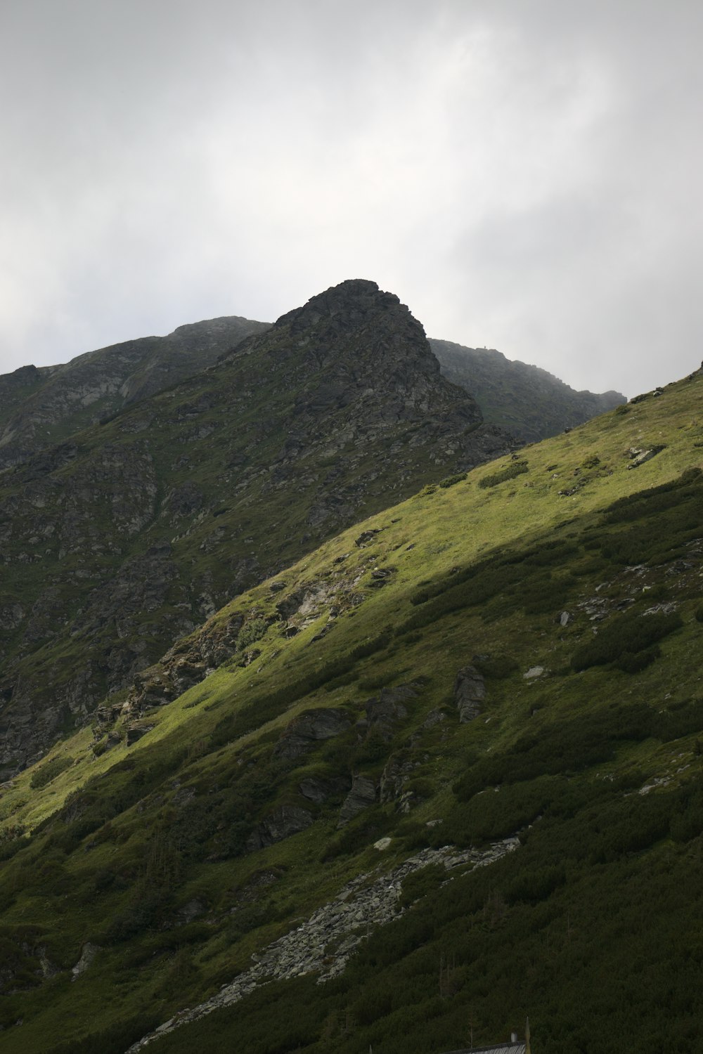 a mountain with a valley below