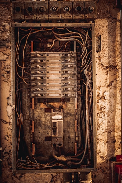 Electrical panel with circuit breakers inside a metal box