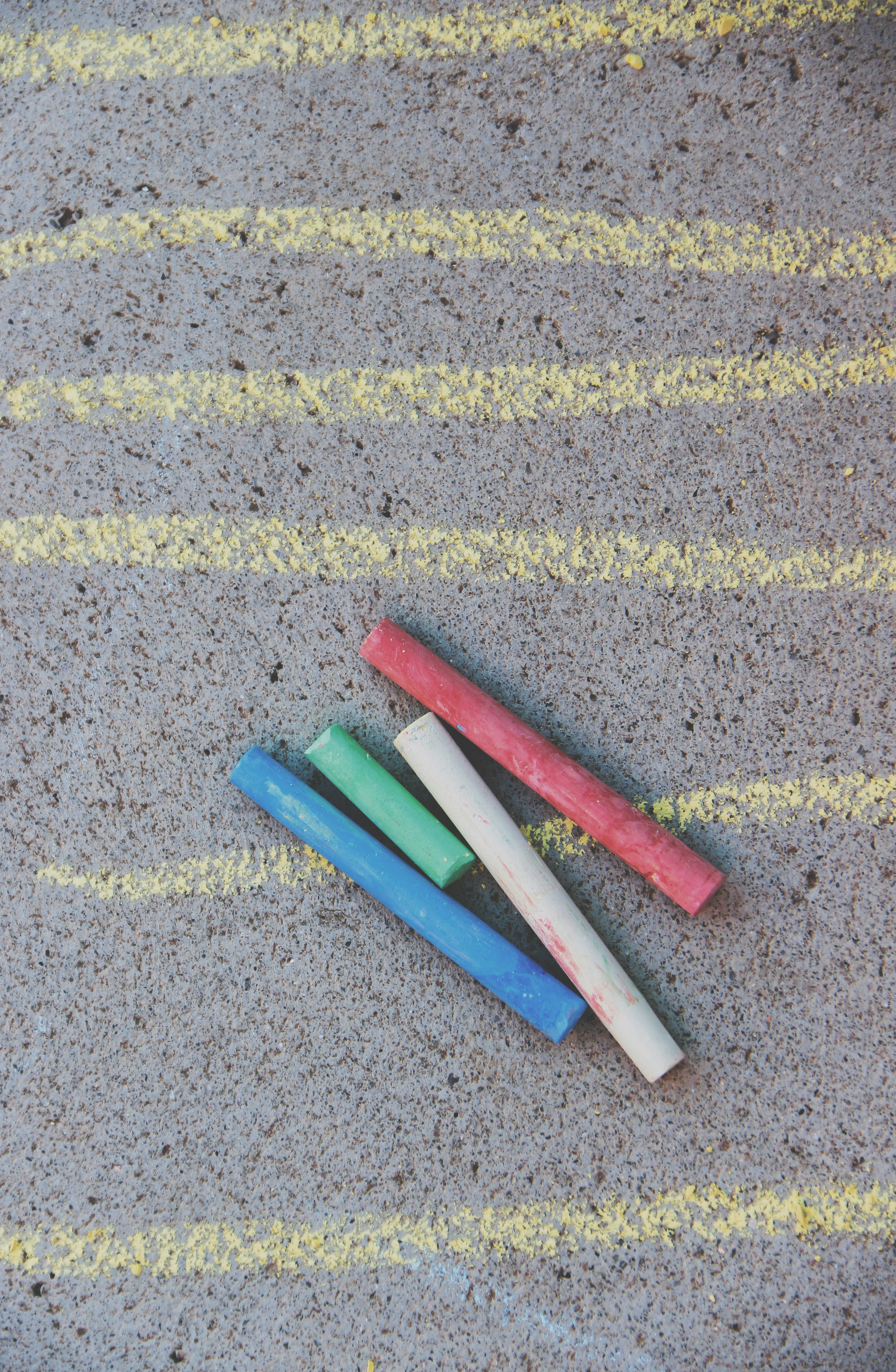 a group of pens on a surface