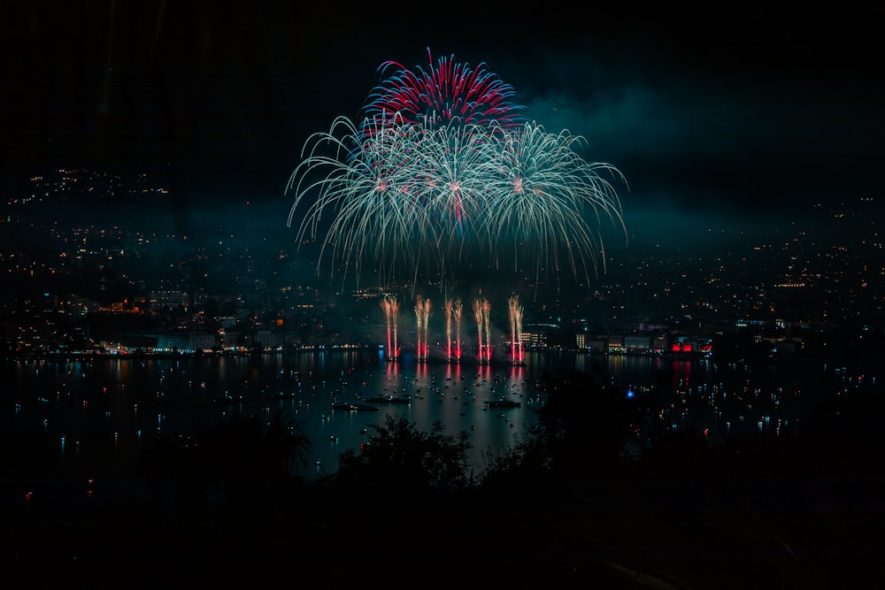 fireworks in the sky over water