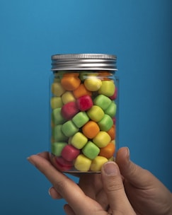 a jar of colorful candies