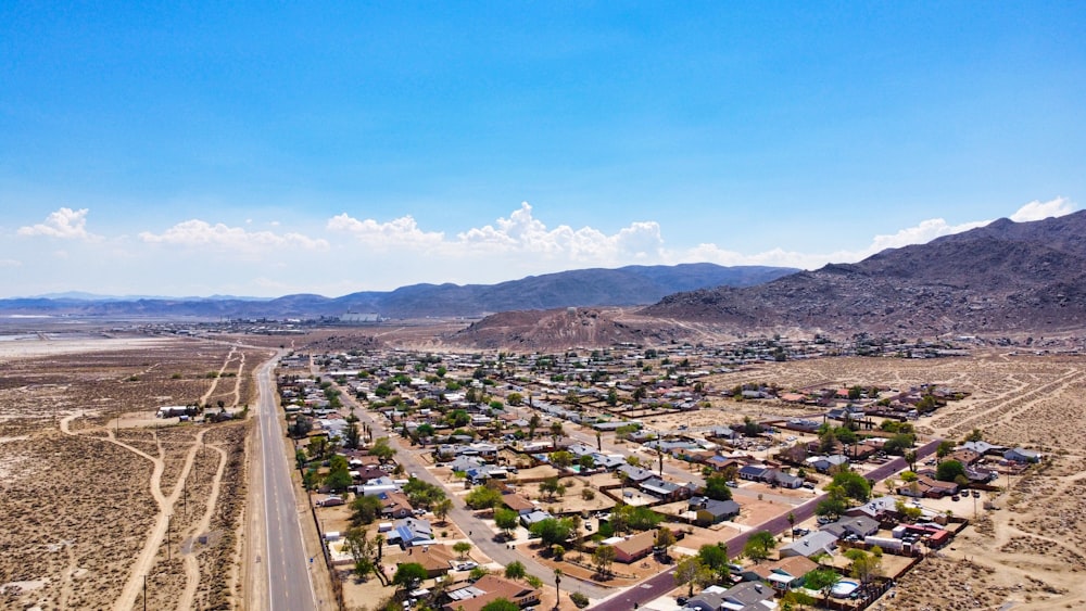 a city with mountains in the background