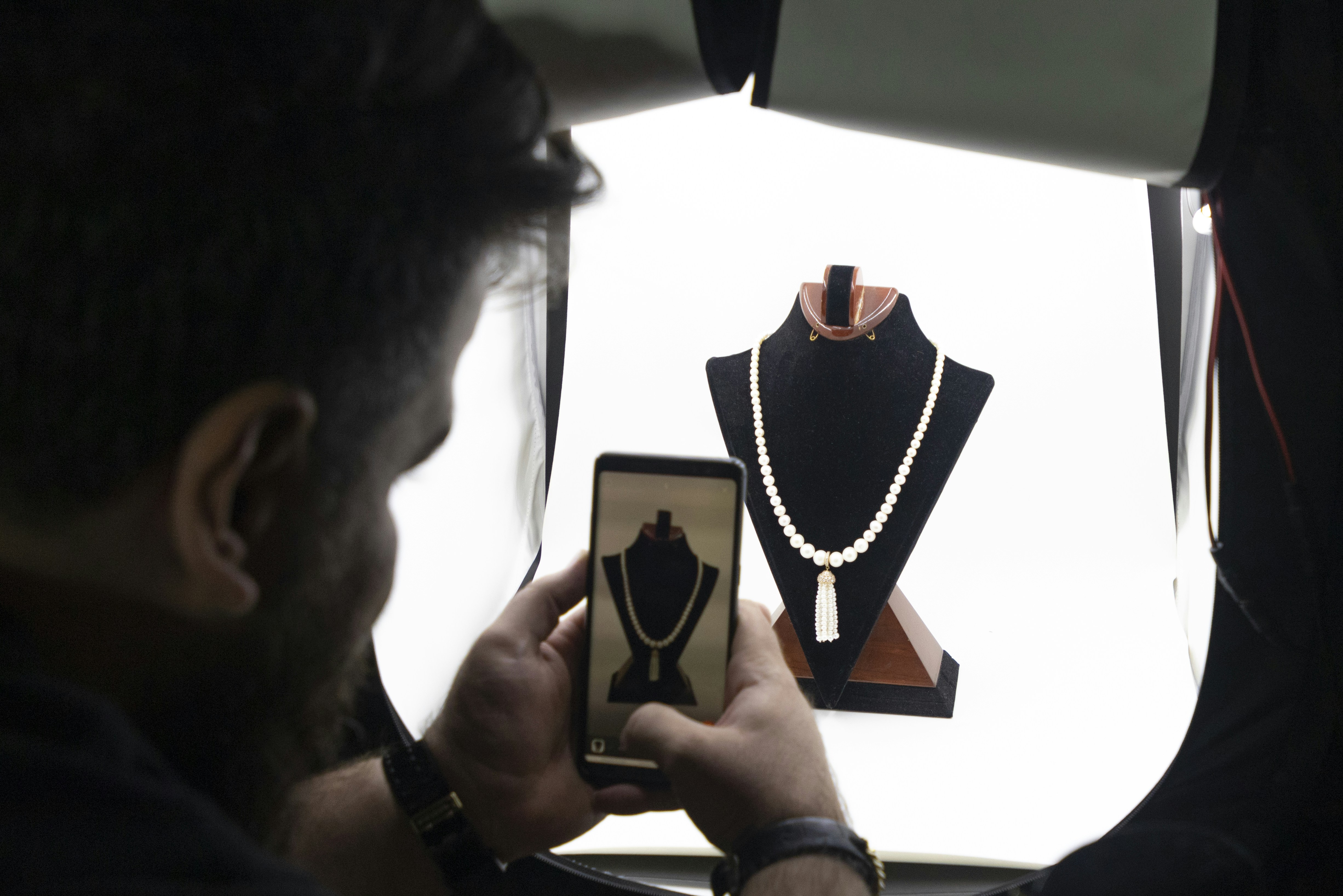 a man holding a cell phone